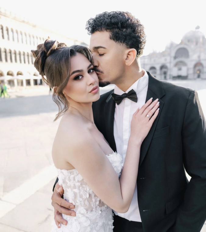 Close portrait of the bride and groom in St Mark's Square, Venice